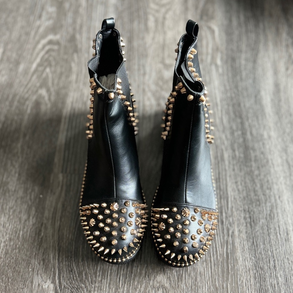 Black and gold studded ankle boots